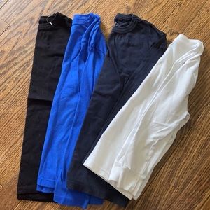 Boys long sleeve shirts size 5/6White shirt is 4/5